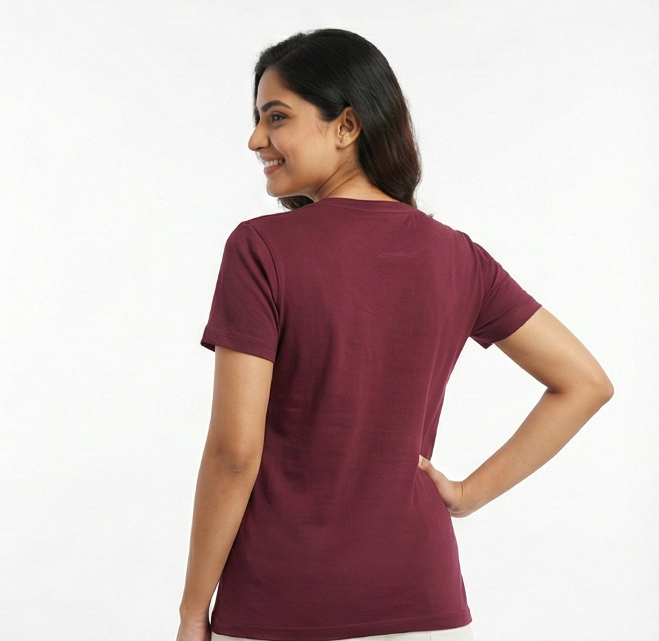 Woman wearing a maroon t-shirt on a white background