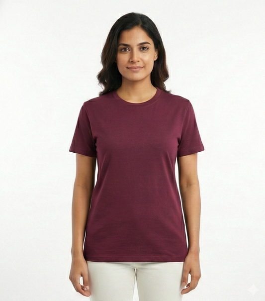 Woman wearing a maroon t-shirt on a white background