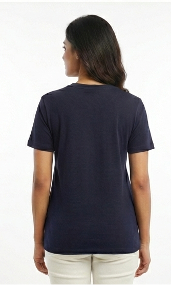 Person wearing a navy blue t-shirt on a white background