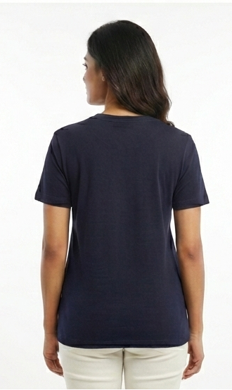 Person wearing a navy blue t-shirt on a white background