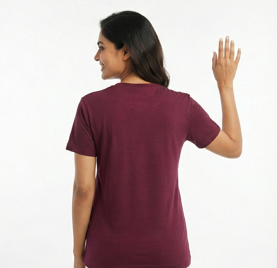 Woman wearing a maroon t-shirt on a white background