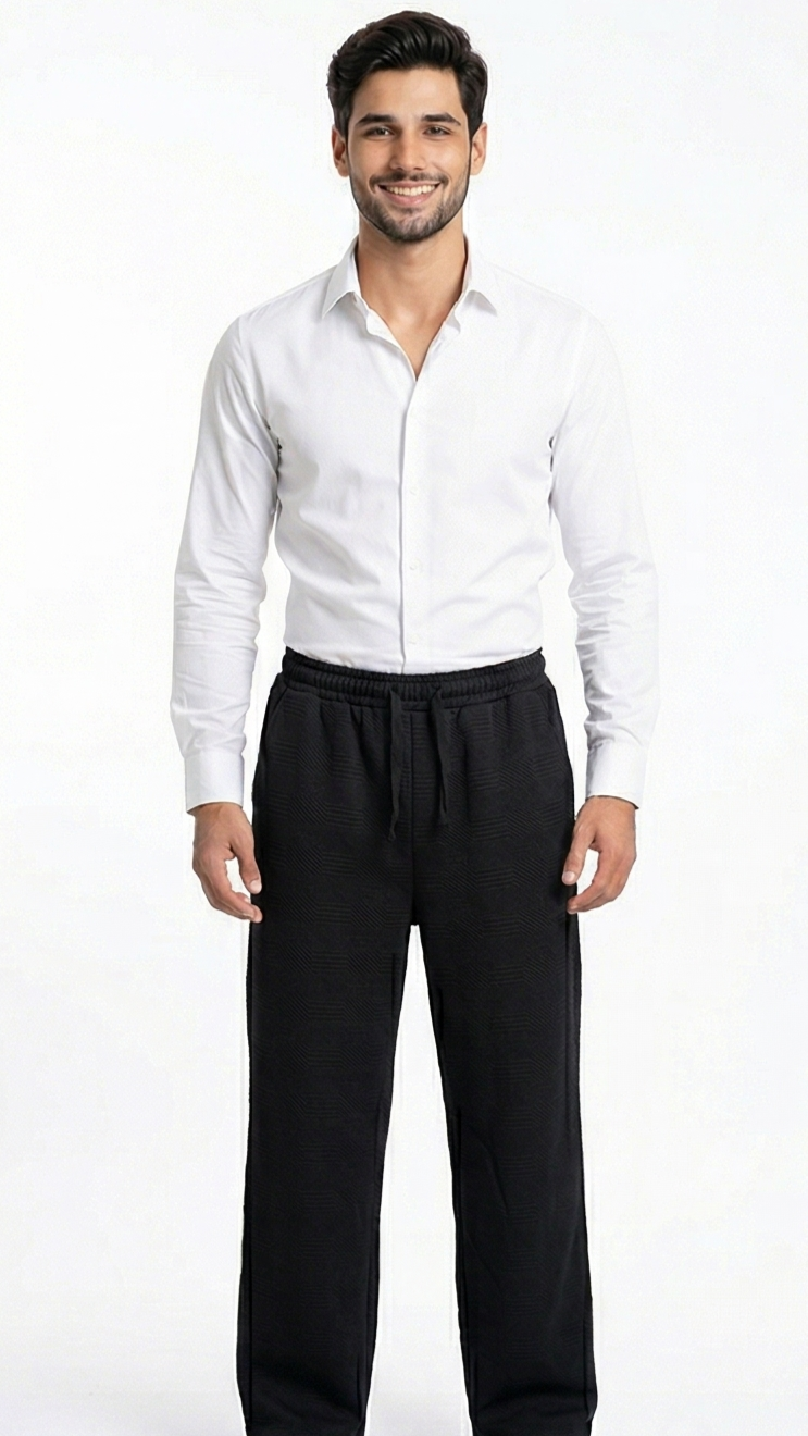 Man wearing a white dress shirt and black pants on a white background
